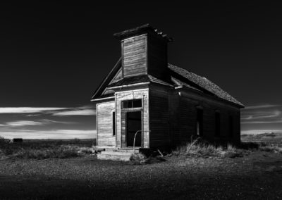 black and white fine art photography of church in ghost town.